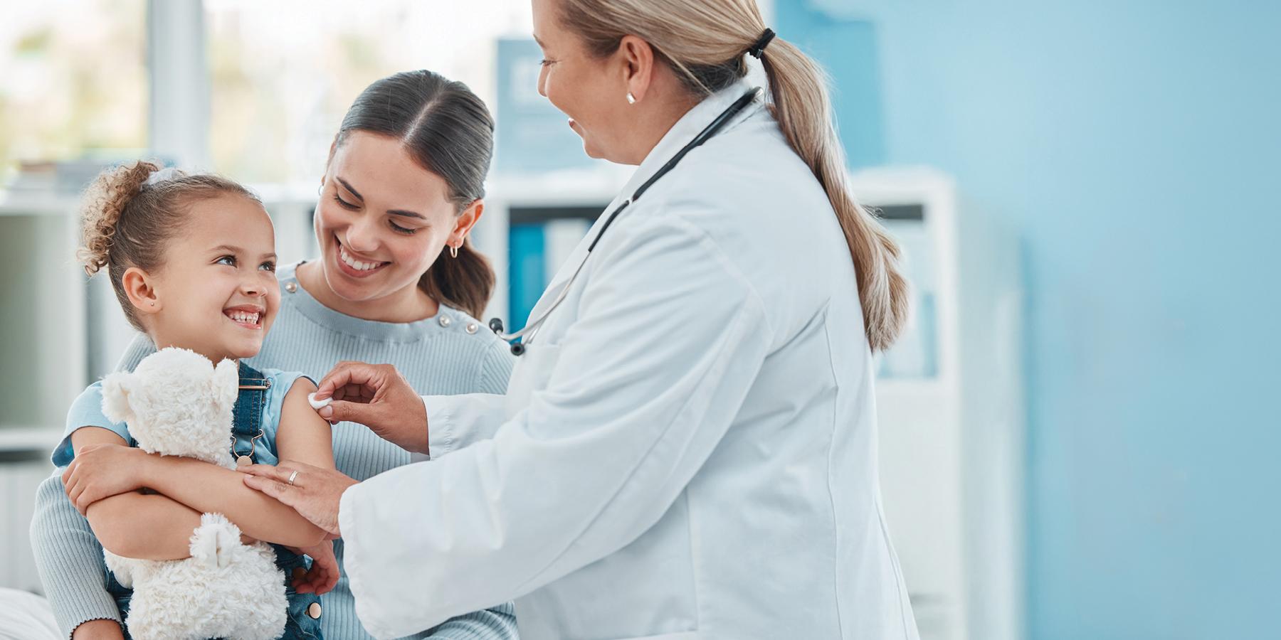girl receiving flu shot