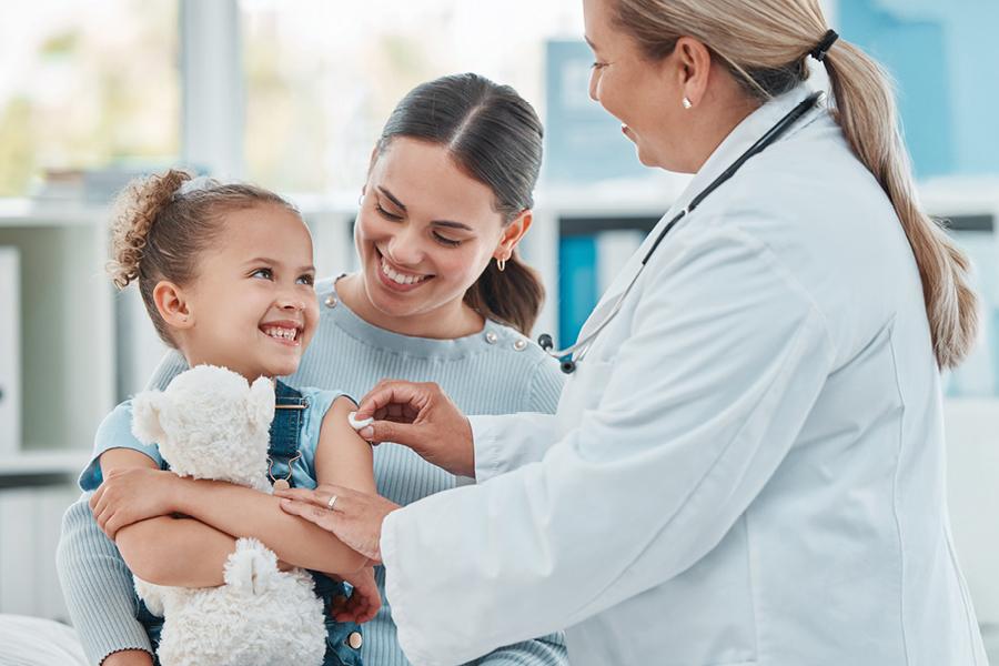 girl receiving flu shot